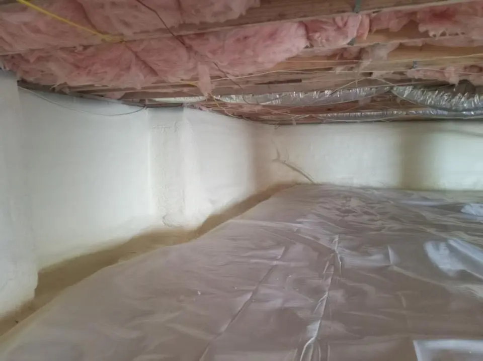 Crawl space encapsulation with closed-cell spray foam for Spray Foam Roofing in Flushing